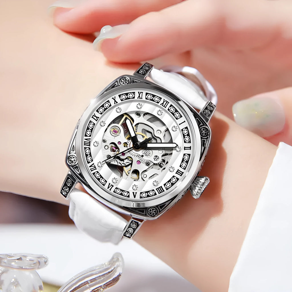 Men's mechanical wristwatch with a leather strap and luminous hands on a dial, shown in one of four colour options.