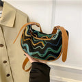 Women's straw woven crossbody bag with internal phone and file organisers in corrugated brown