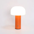 USB dual-purpose table lamp in black, green, orange or white with plug-in and charging functionality