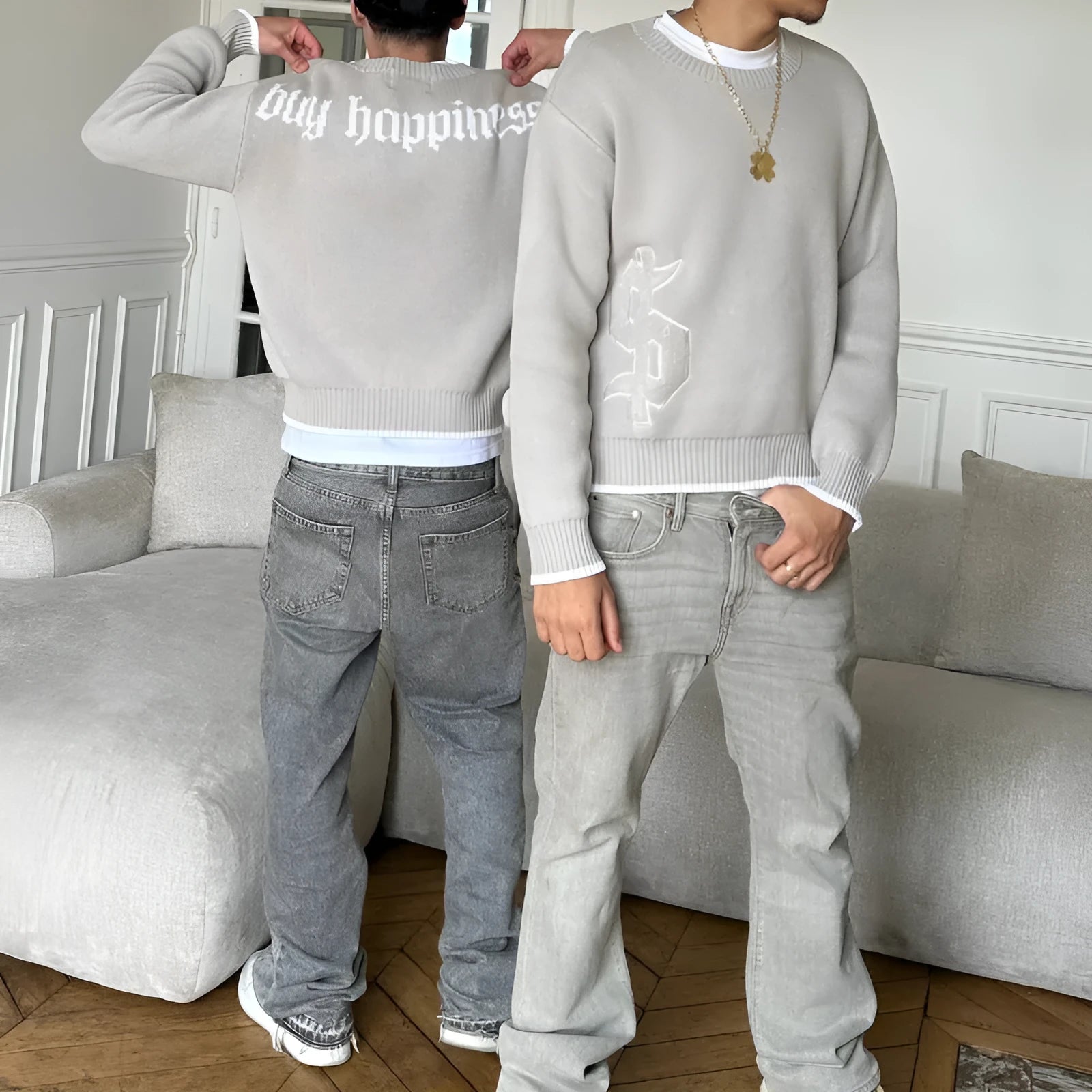 Grey loose-fitting knitwear coat with long sleeves and textured Jacquard weave pattern