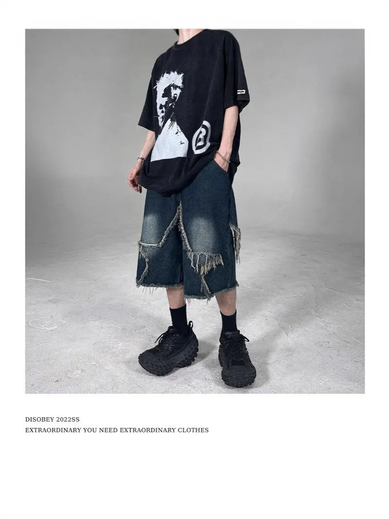 Blue men's denim shorts with frayed hem and five-pointed star decoration in loose retro style