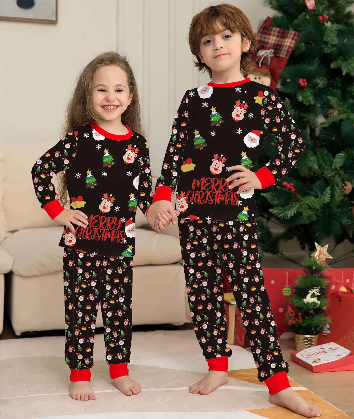 Family wearing matching red plaid Christmas pajamas with dog in matching pet pajamas