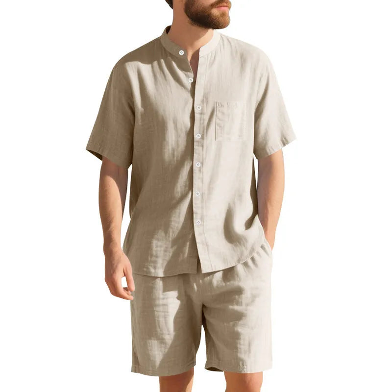 Men's light blue linen-blend summer suit with short sleeve shirt jacket and matching shorts on a hanger.