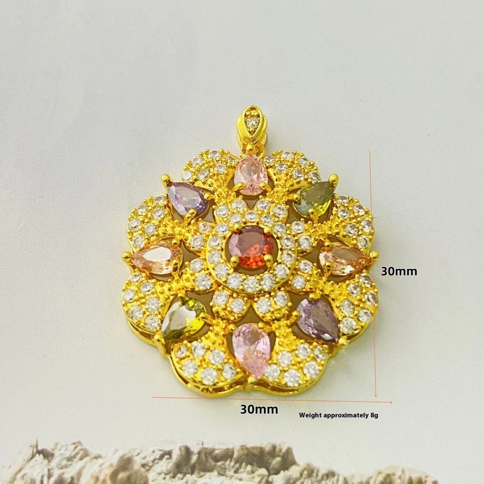 Women's flower-shaped zircon pendant necklace in gold tone on a model.