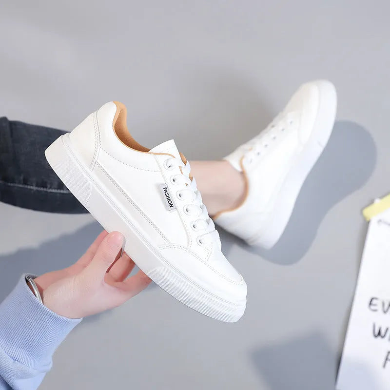 Women's white and brown Korean-style low-top sneakers with artificial PU upper and plastic sole.