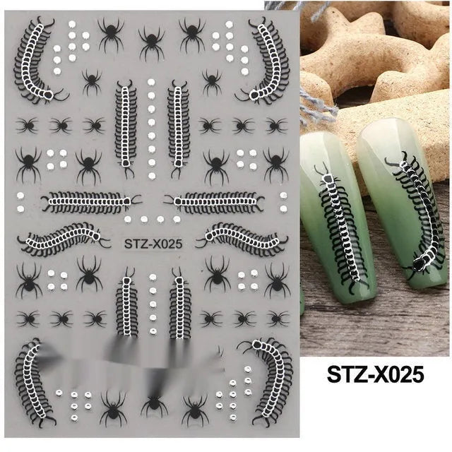 Close-up of a cartoon-style nail sticker with black and silver strips and a love pattern design on a fingernail.