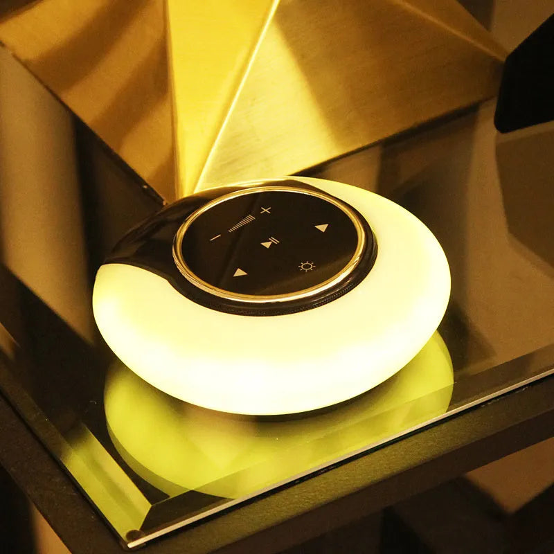 Bluetooth speaker desk lamp with touch controls, foldable design and LED lighting in three colour options