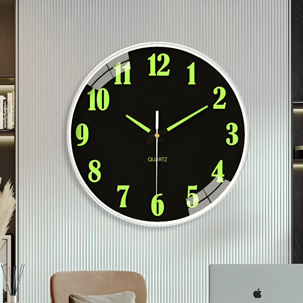 8 inch round luminous wall clock with modern plastic shell on a wall