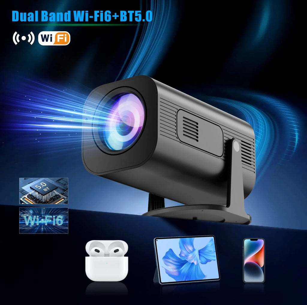 Black or white portable mini projector with remote control and power cord on plain background