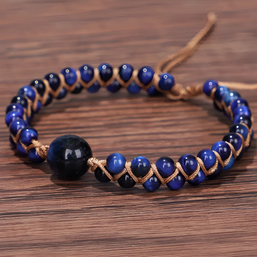 Handmade woven pull bracelet with tigereye and amethyst beads in geometric pattern