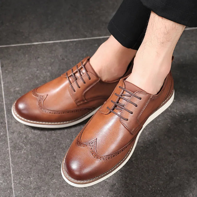 Men's black slip-on casual shoe with round toe and carved TPR sole for business wear.