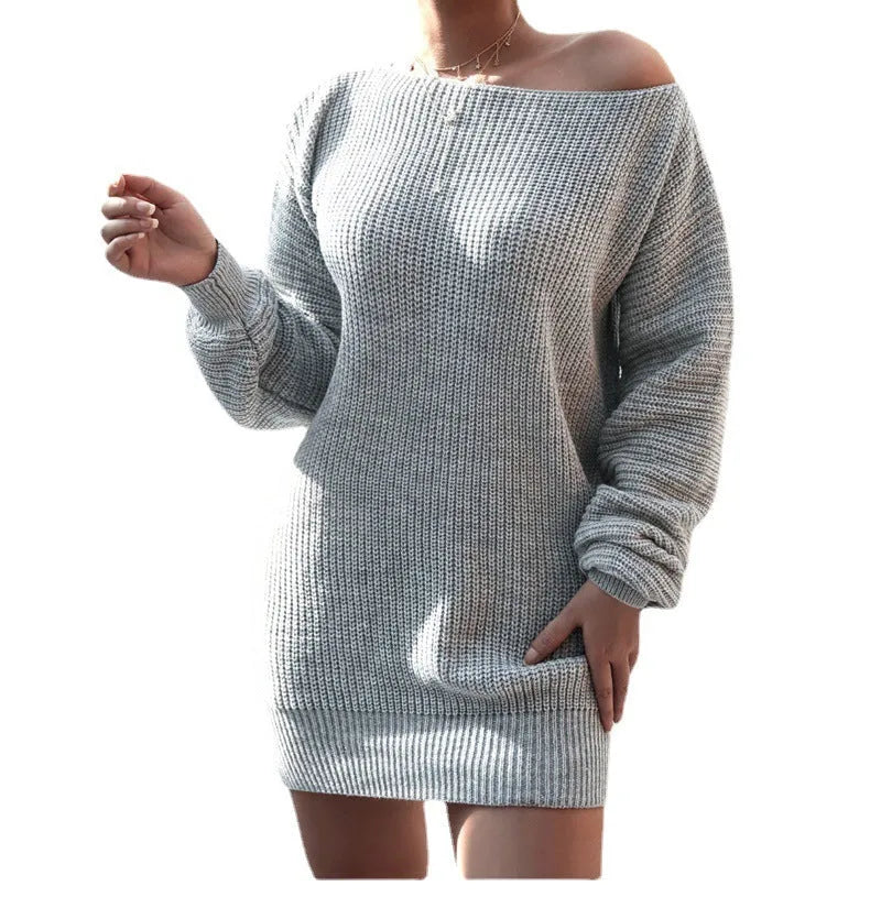 Women's knitted sweater dress with lantern sleeves in solid colour, medium length pullover design
