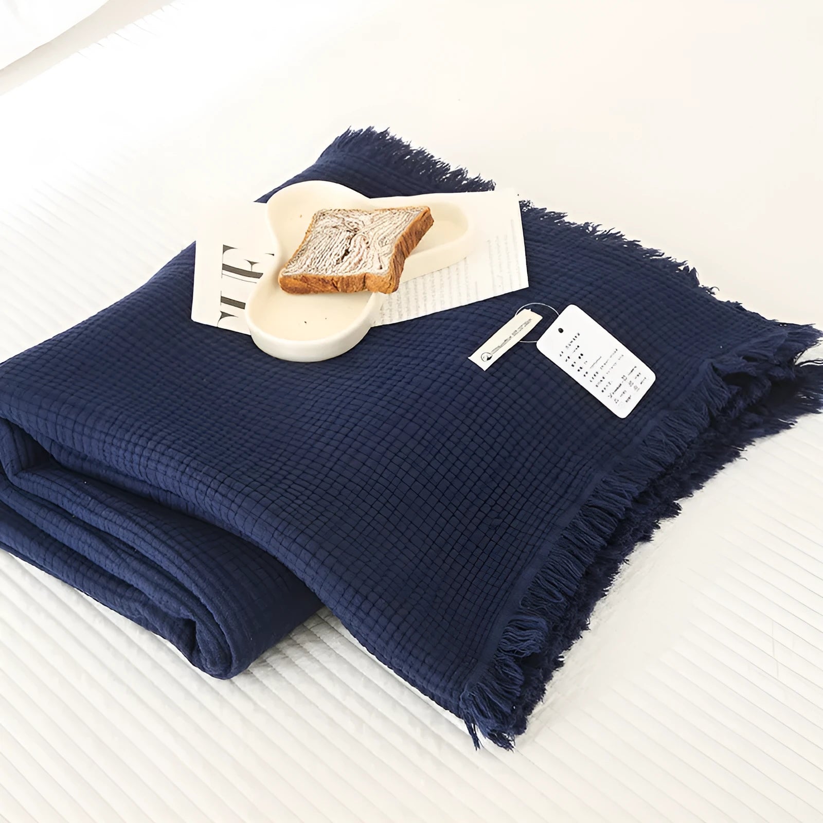 Four-layer gauze cotton blanket with tassel trim in navy blue colour