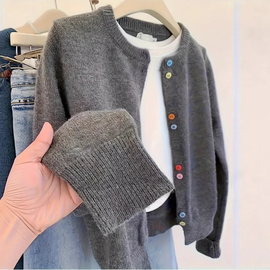Dark grey women's cardigan sweater with button front and regular sleeves for office commuting