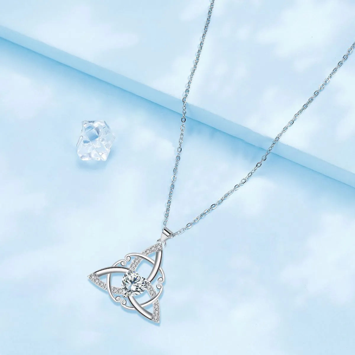 Women's Celtic knot pendant necklace in electroplated copper with geometric design
