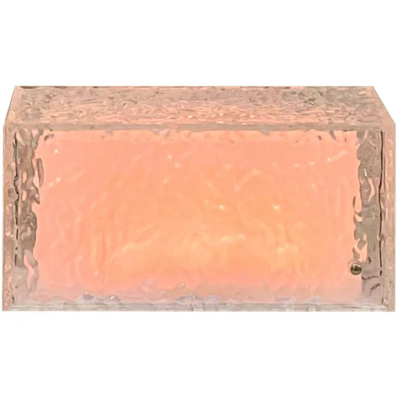 Small white acrylic cube night lamp with geometric design and coloured LED lighting