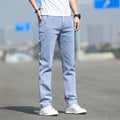 Men's smoky grey autumn jeans with straight tube fit and low waist design on hanger