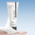White bottle of 100ml whitening and freckle removing facial cleanser for pore cleansing.