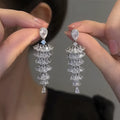 Silver pagoda coloured Christmas tree drop earrings with sparkling zircon for women.