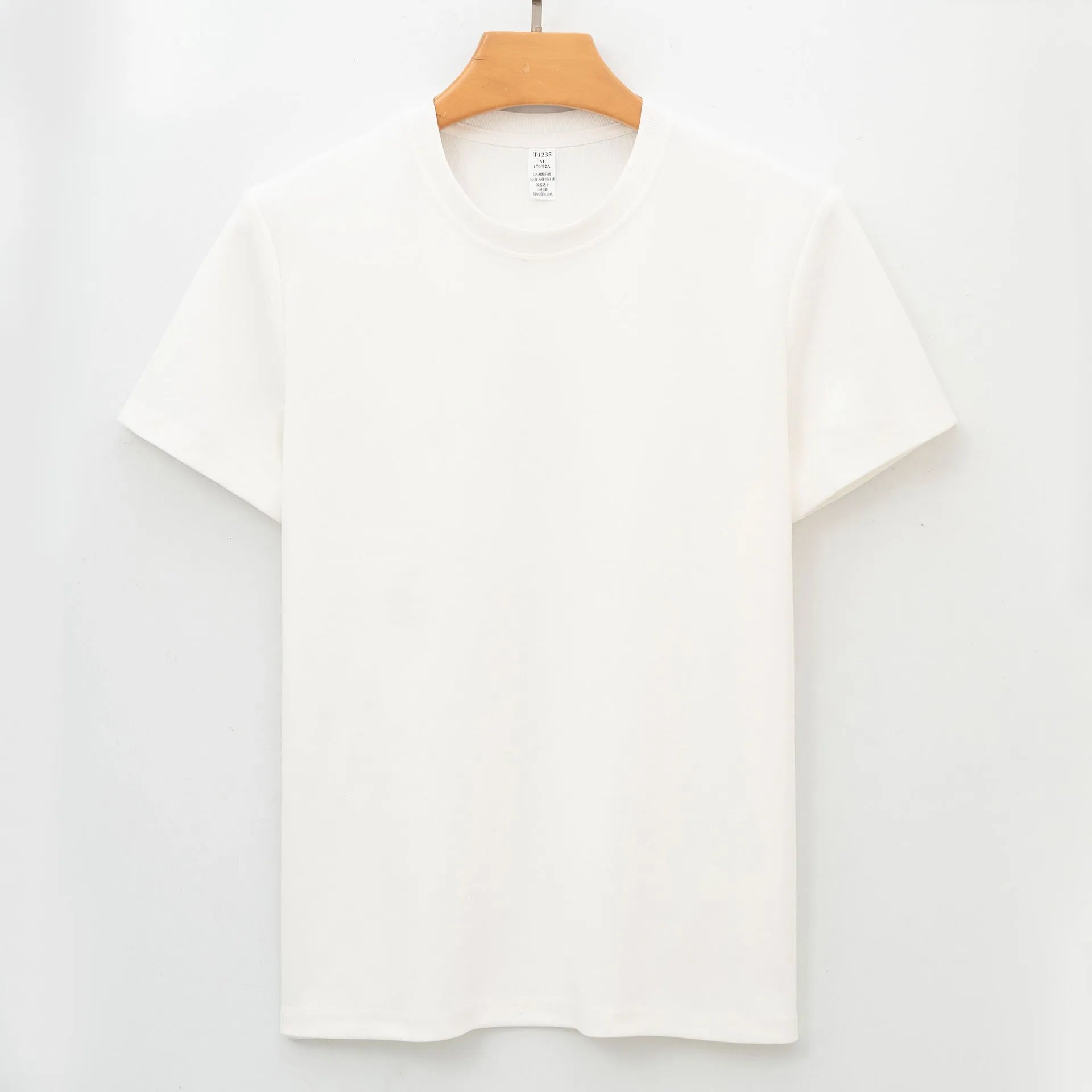 Men's beige short-sleeve antibacterial quick-dry T-shirt laid flat.