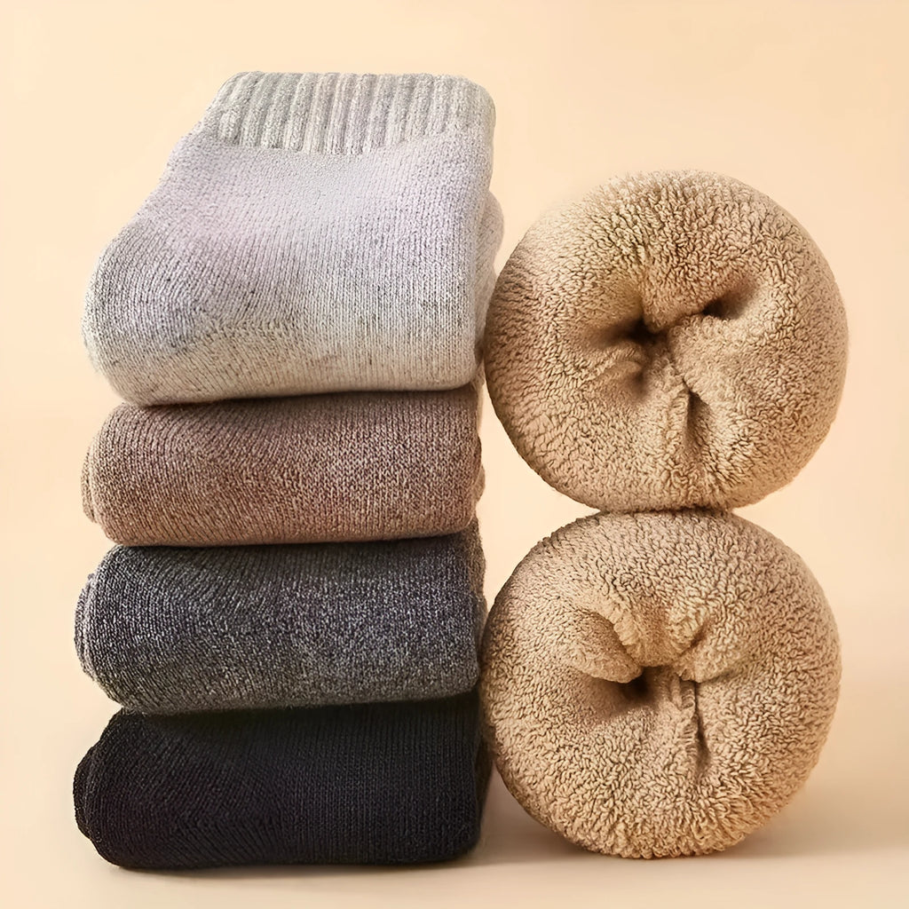 Pair of thick cotton winter socks in a solid colour, presented in a box.