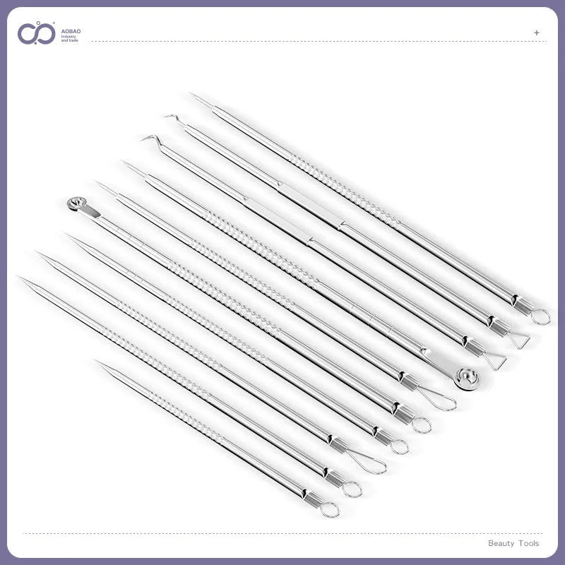 Four silver metal acne needles with pointed tips for skincare extraction