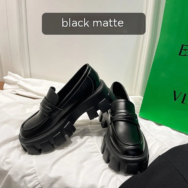 British style wide fit loafers for men and women in either matte or glossy patent leather.