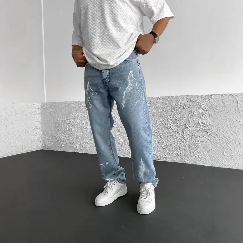 Men's blue straight-leg denim jeans with wide leg cut and mid waist design