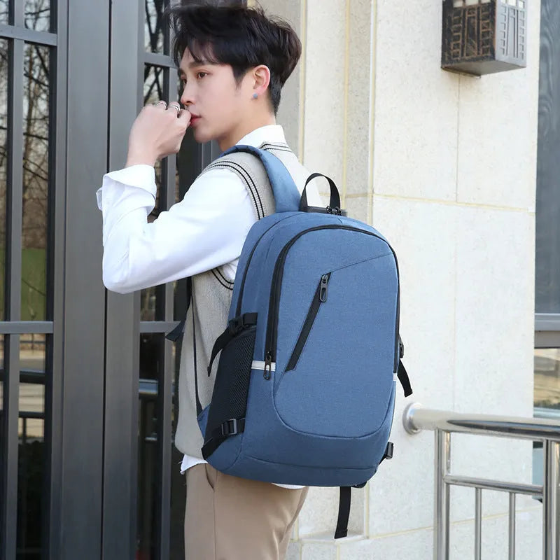 Grey Oxford cloth computer backpack with street trend style, shown with laptop compartment and front pocket.