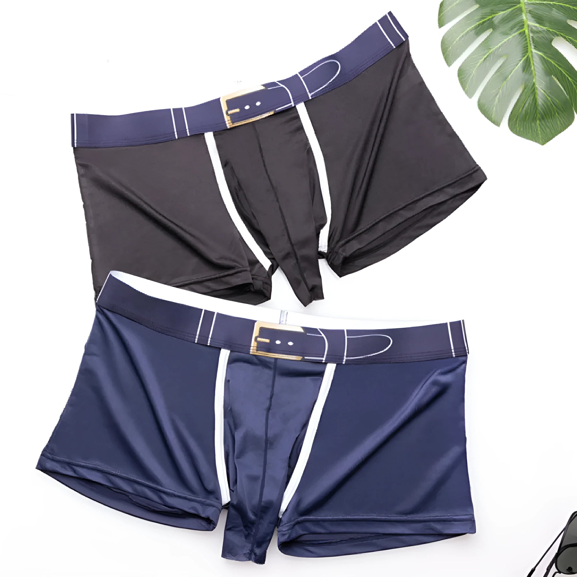 Men's solid colour ice silk boxer shorts in blue, shown on a mannequin, demonstrating the mid waist fit.