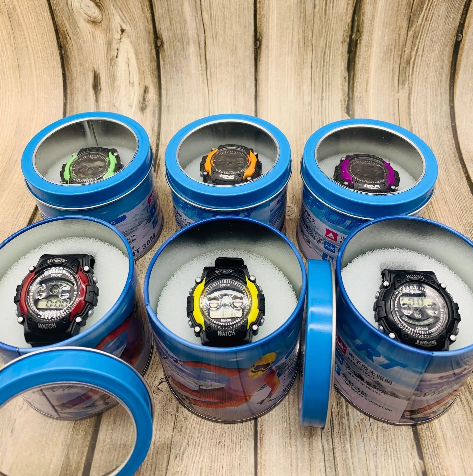 Children's digital electronic watch with large dial, silicone strap, showing alarm and time display