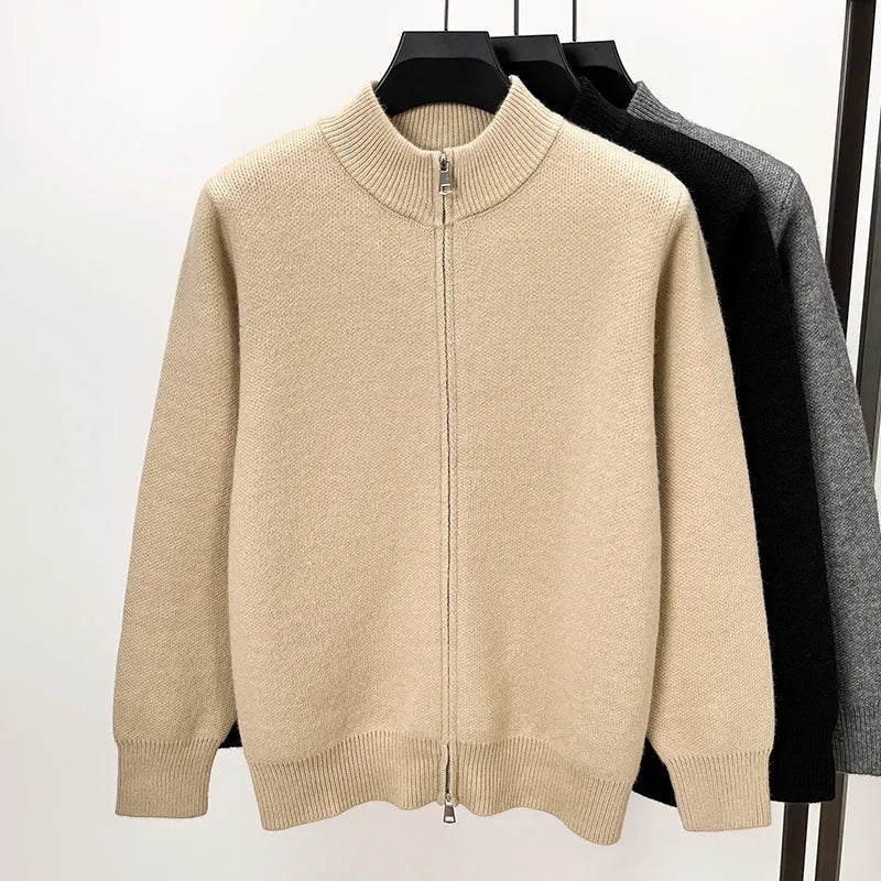 Men's black zip-up knitted cardigan with a stand collar on a hanger