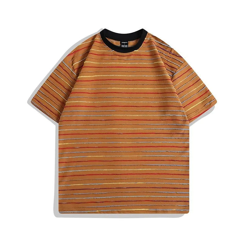 Loose fit round neck cotton t-shirt in apricot colour with half sleeves on a hanger.