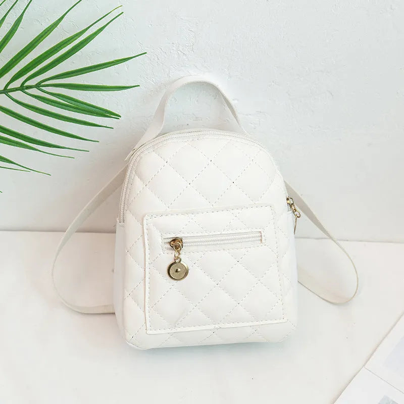 Girls' hard PU backpack with Korean embroidery in black, vertical square shape with soft carry handle
