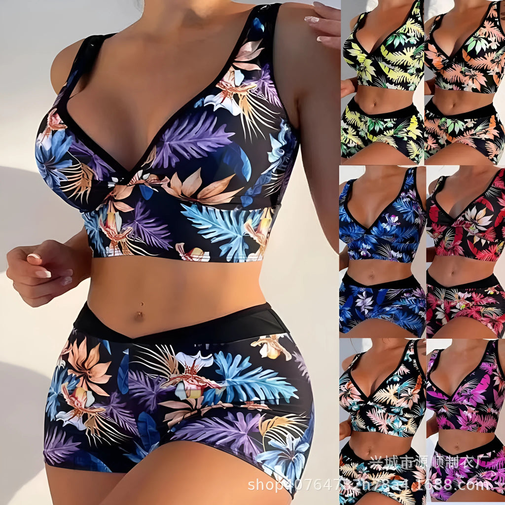 Women's two-piece printed swimsuit set with sleeveless top and boxer shorts in a multi-colour design.