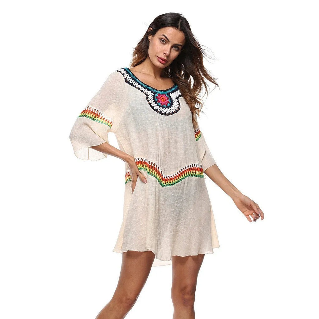 Crocheted white sun protection beach cover-up top for women, loose fit.