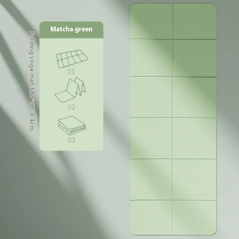 Blue TPE folding yoga mat unfolded on a floor, showing its 183cm length and non-slip texture.