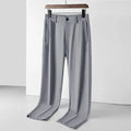 Men's black loose-fit Ice Silk trousers with a straight leg and elasticated waistband.