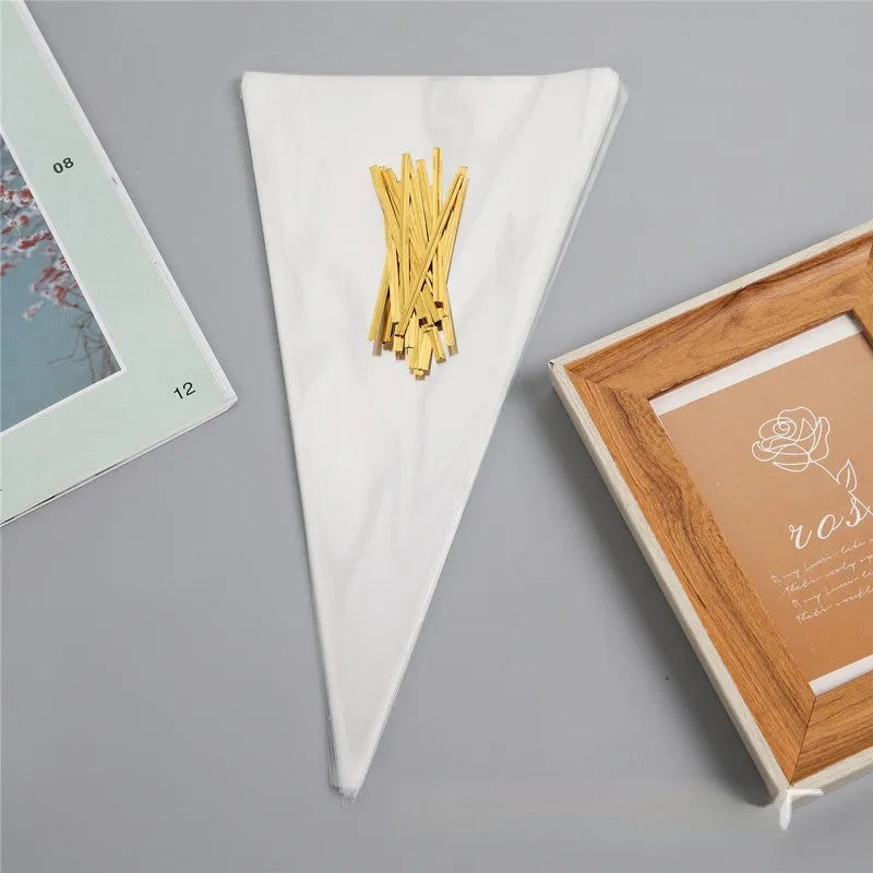 Clear plastic triangle-shaped bag with a twisted metal tie wire closure.