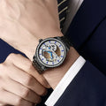 Men's luxury zircon mechanical watch with transparent case back on a black leather strap