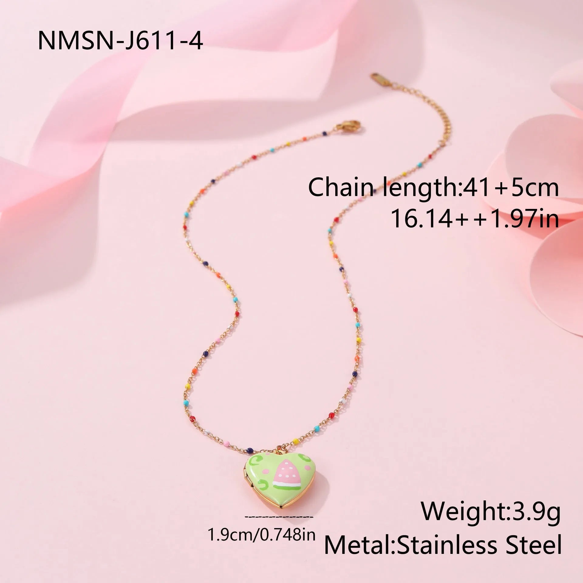 Gold-plated heart-shaped fruit pendant necklace on a stainless steel chain, showing grape design detail.