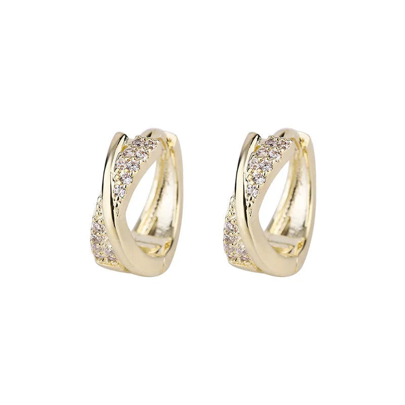 Geometric copper hoop earrings with zircon detailing in 14K yellow colour