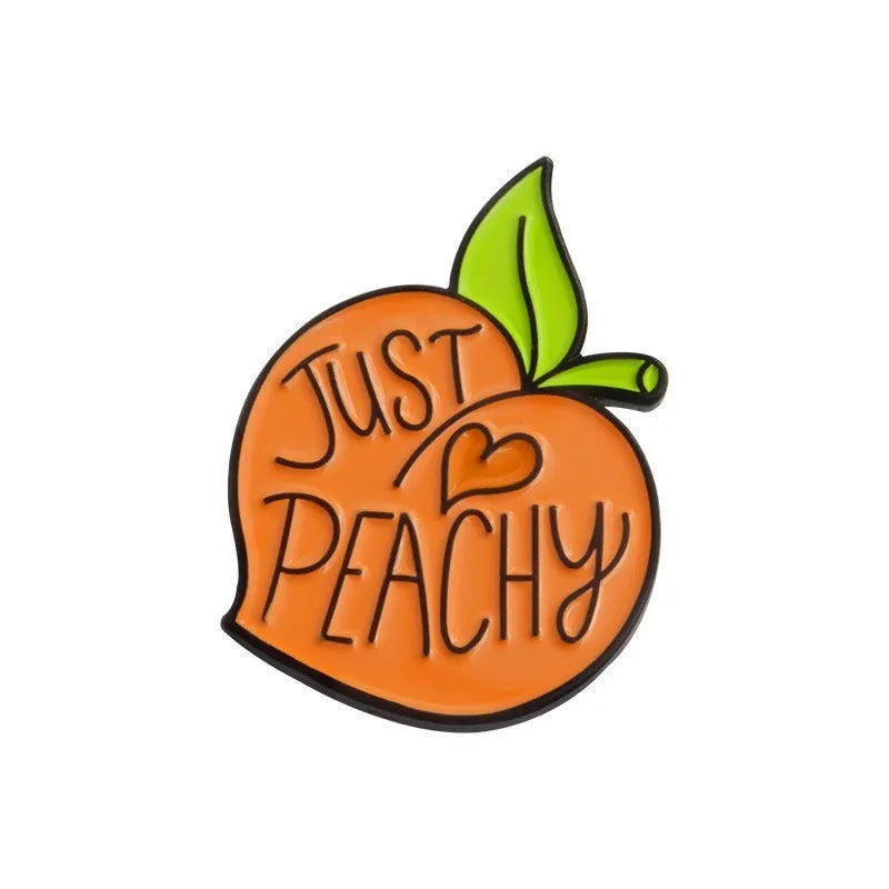 Colourful cartoon fruit and letter shaped zinc alloy brooch pin on fabric