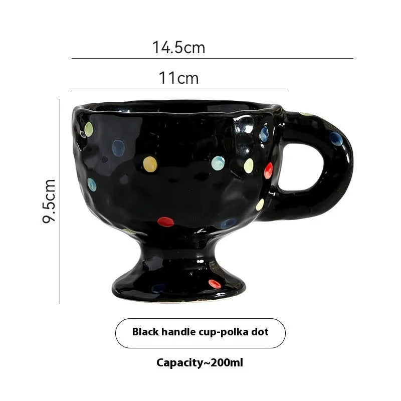 Hand-pinched irregular ceramic mug with modern minimalist design in solid colour