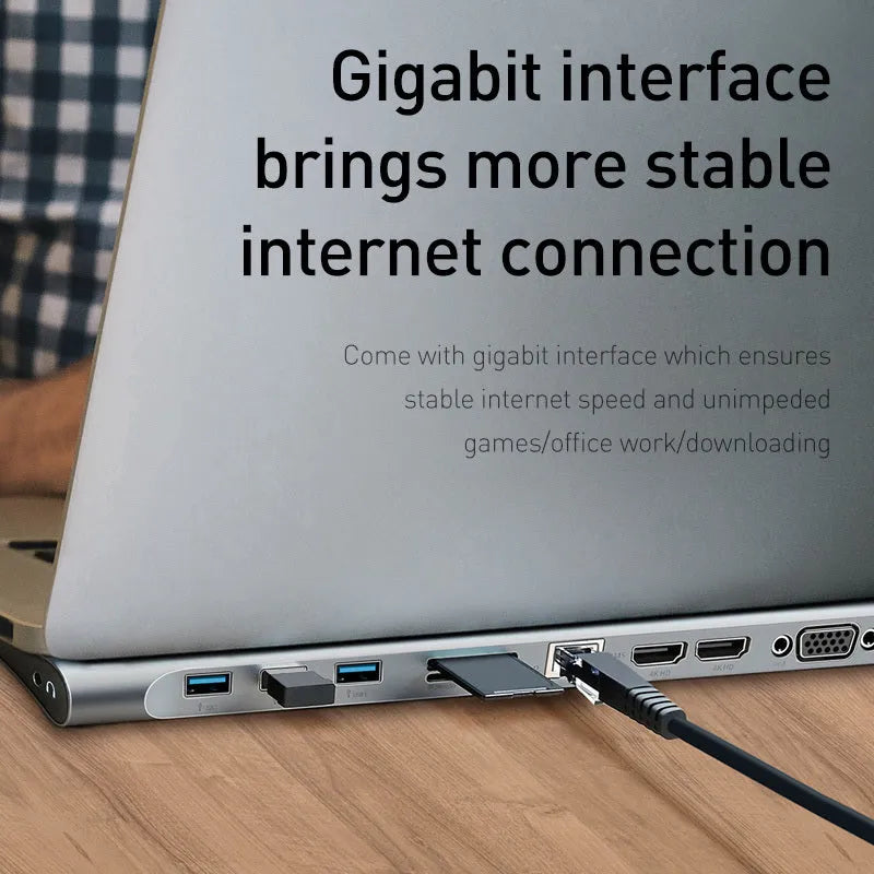 Ten-port USB C hub docking station with aluminium cooling bracket showing HDMI, VGA, and network ports