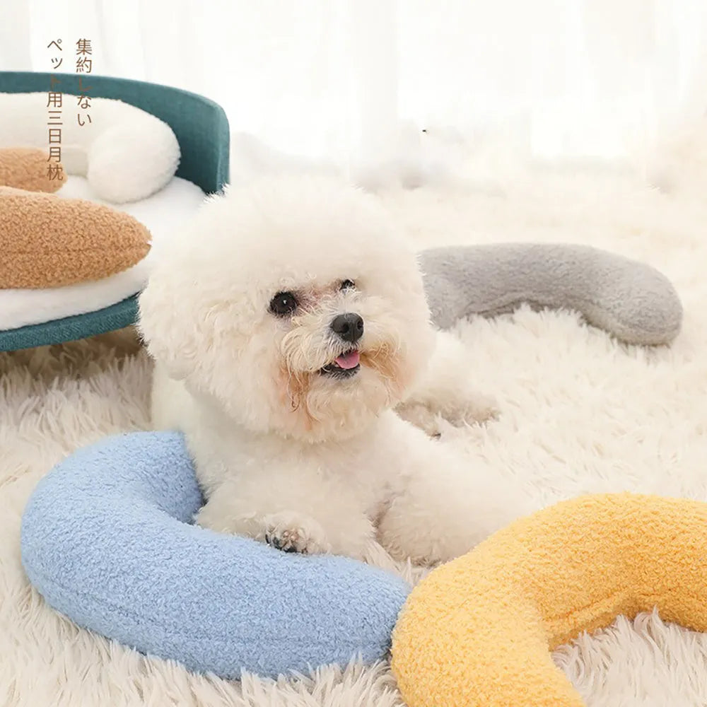 U-shaped blue cat pillow with an adjustable fabric collar for pet neck support.