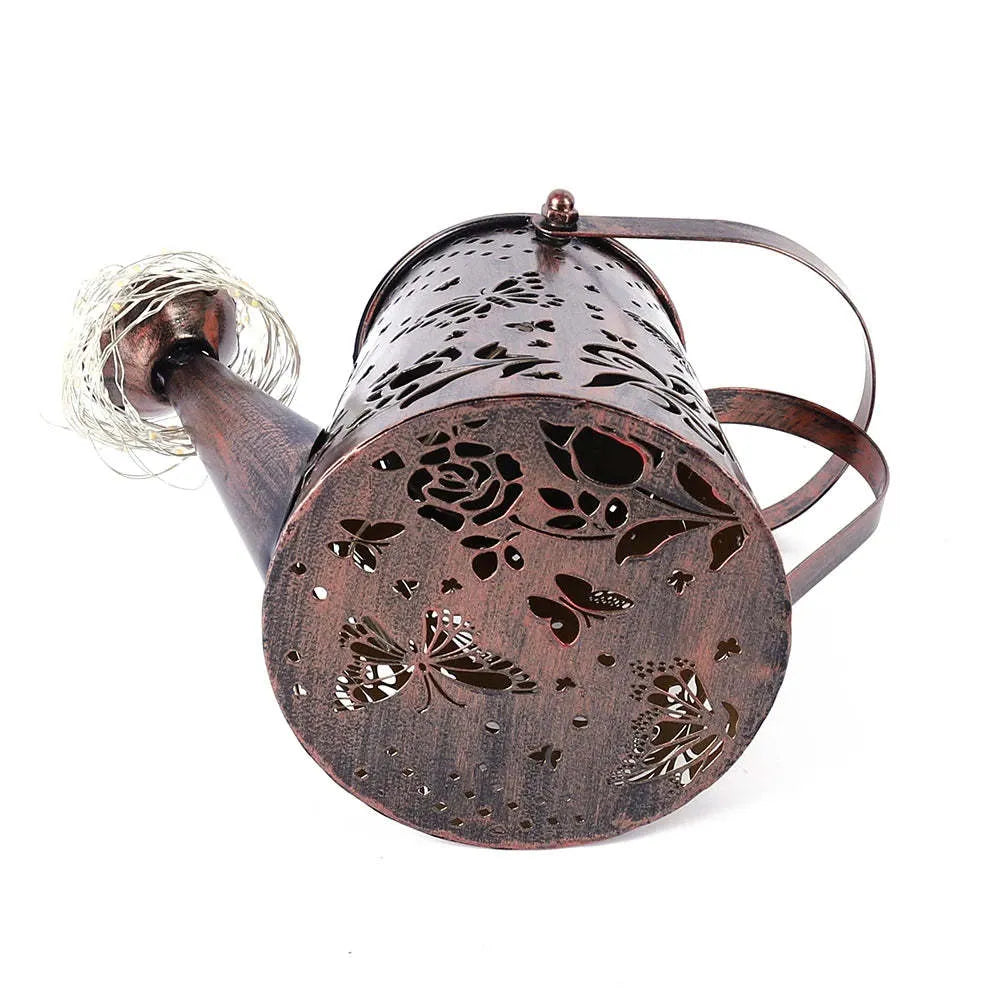 Butterfly pattern solar garden lamp with tapered iron construction and warm white LED lighting