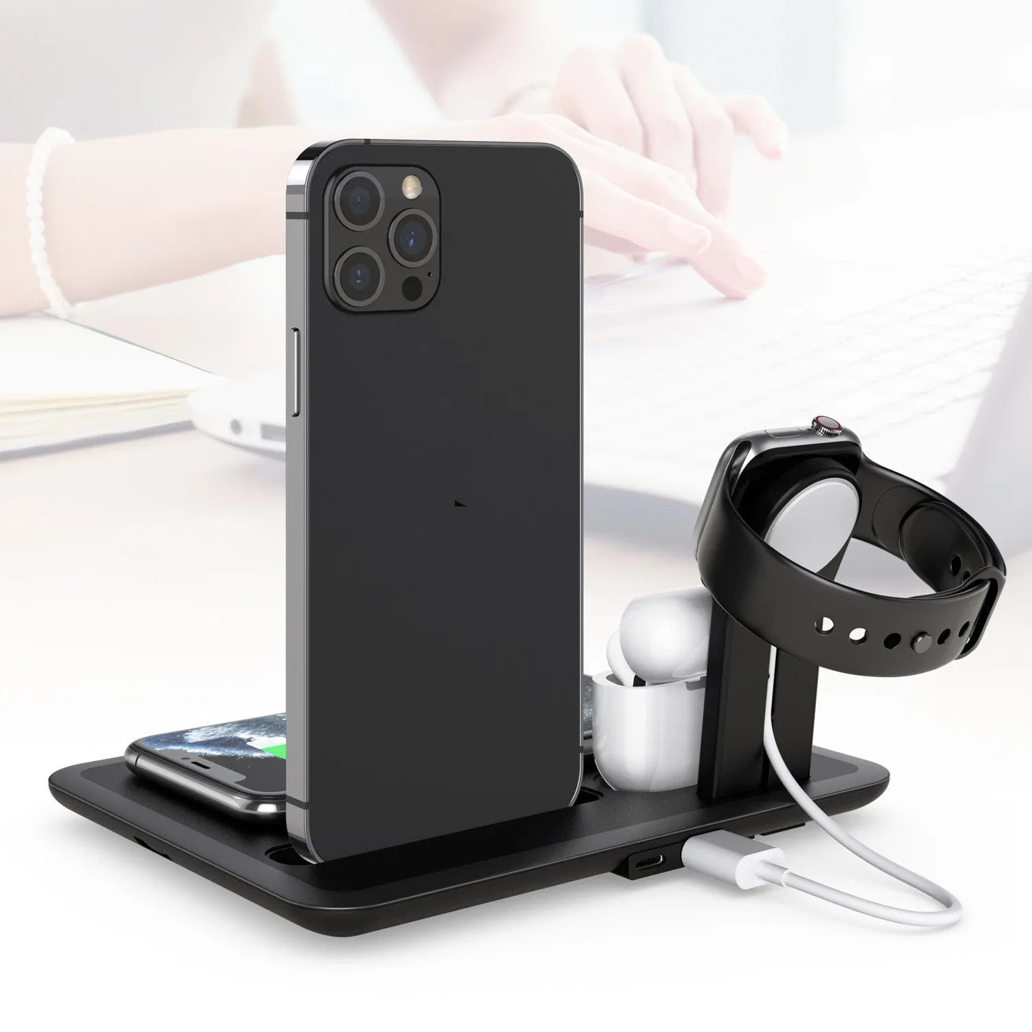 Black and white desktop wireless charging station for phone, watch, and headphones