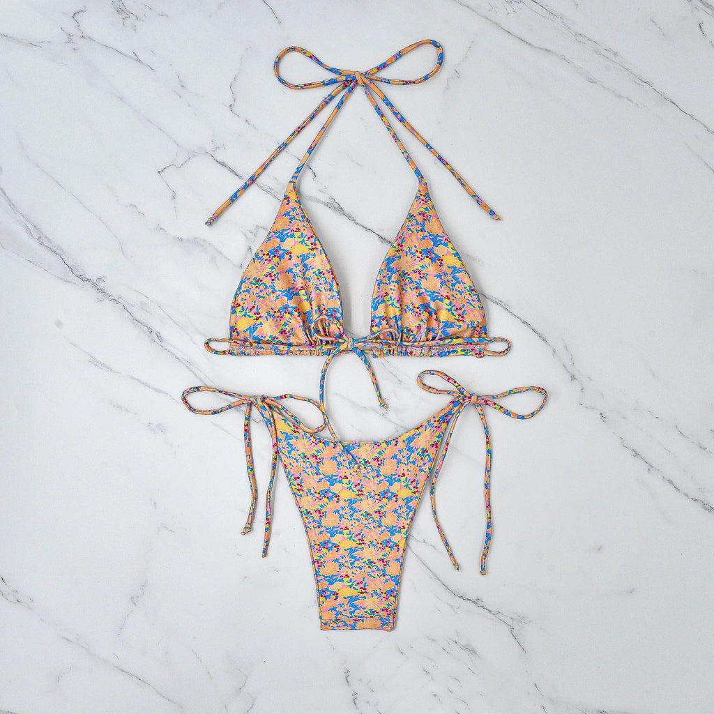 Lace-up bikini swimsuit with backless design and split briefs in polyester fabric