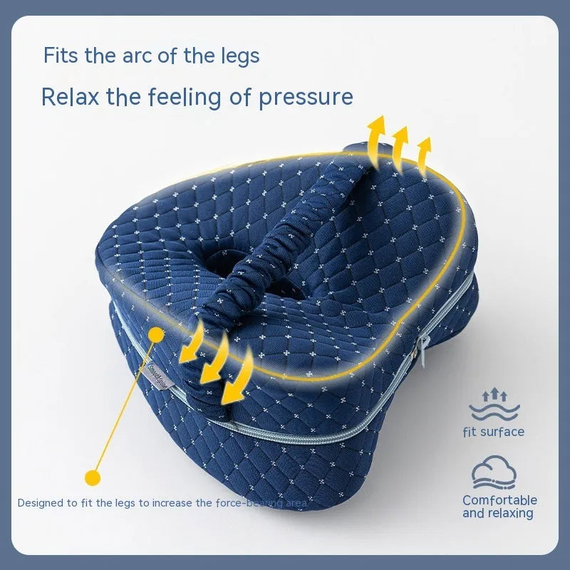 Love heart-shaped dark blue memory foam leg pillow for knee support.